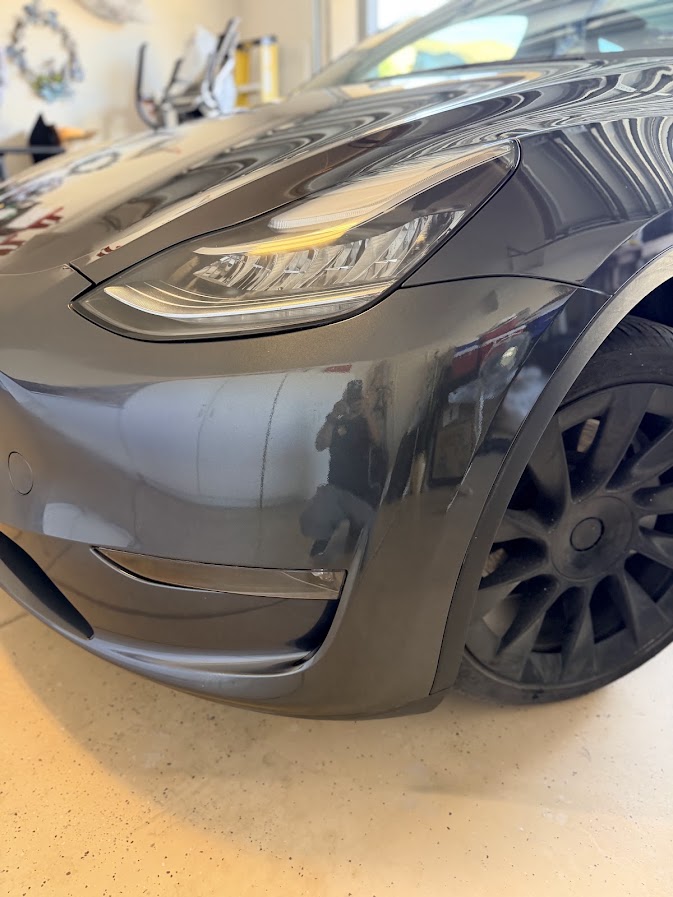 Same Tesla Model Y front bumper repaired, colour-matched and refinished