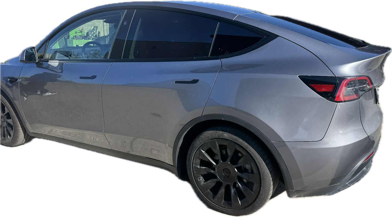 Midnight Silver Tesla Model Y side and rear quarter after repair