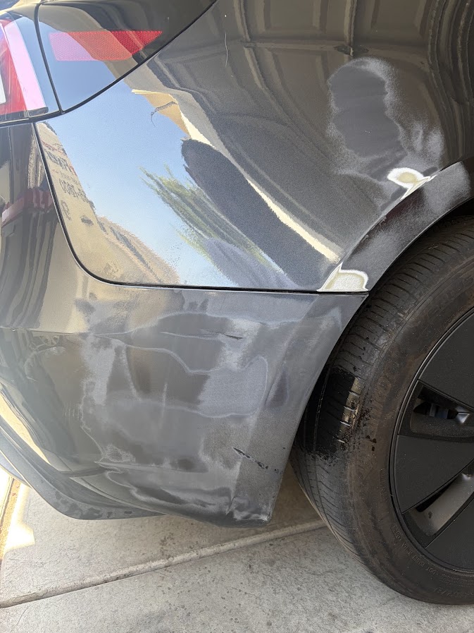 Midnight Silver Tesla Model 3 rear bumper and quarter panel sanded and in bodywork